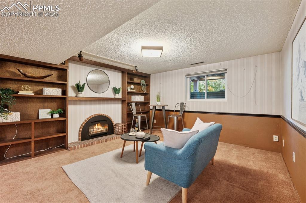 Image 35 of 49: Fireplace #3 in the basement