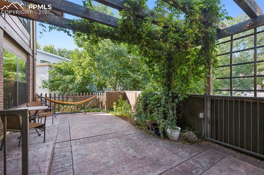 Image 8 of 49: Patio has electrical for a hot tub