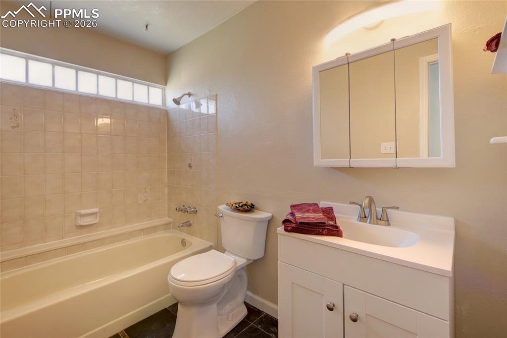 Image 15 of 36: Main level full bathroom