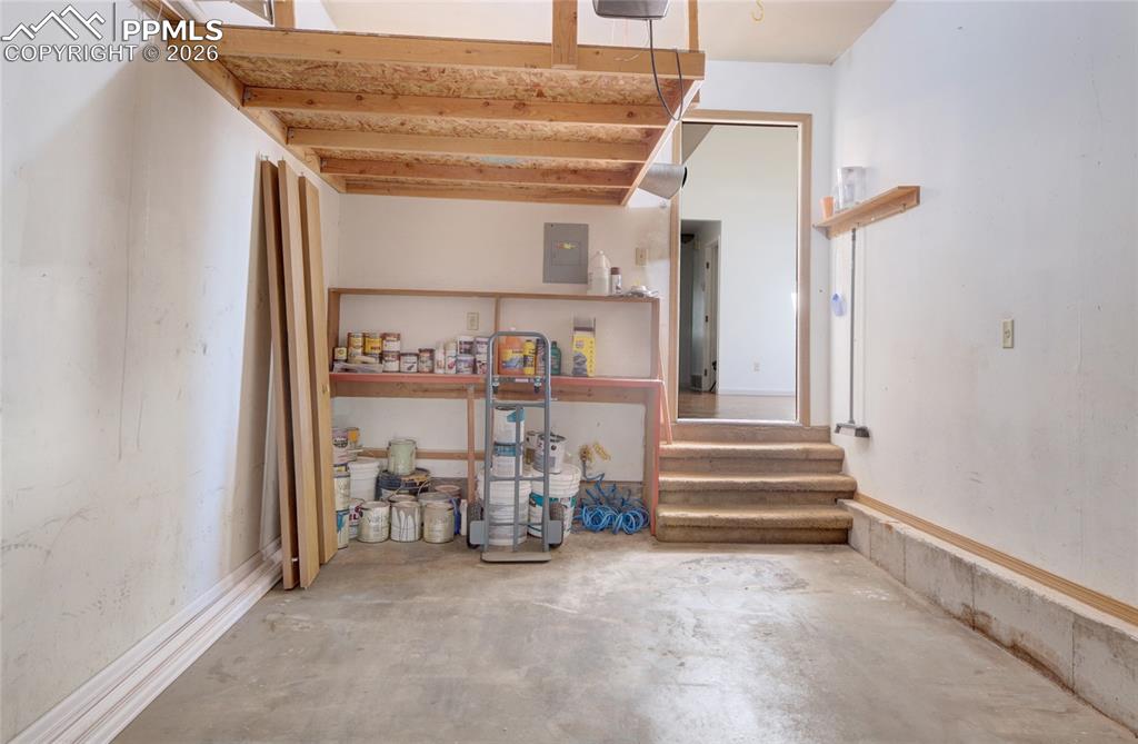 Image 28 of 36: Garage offers storage