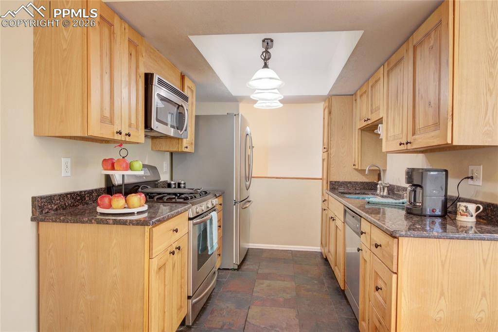 Image 4 of 36: Tiled floors and tastefully selected lighting