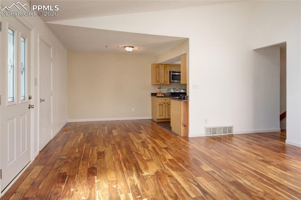 Image 9 of 36: Awesome hardwood is showcased