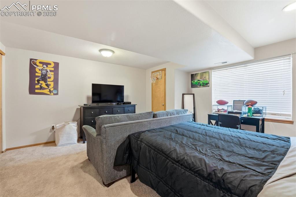 Image 44 of 50: Basement Bed