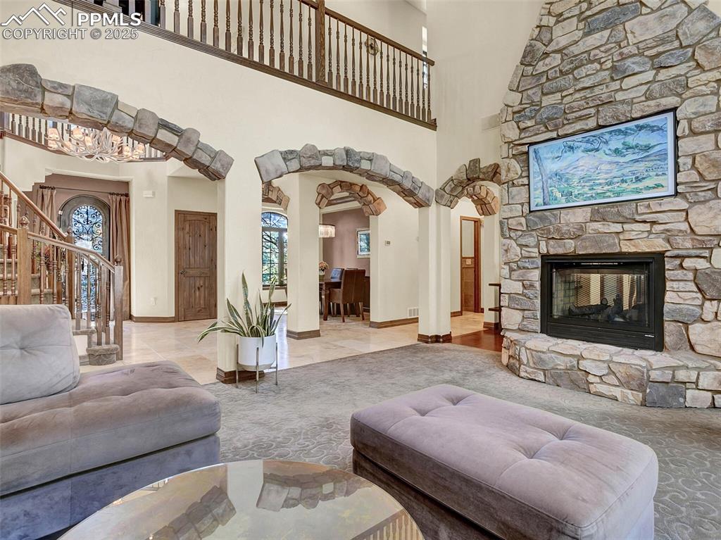 Image 11 of 37: Living room looking into foyer and dining room