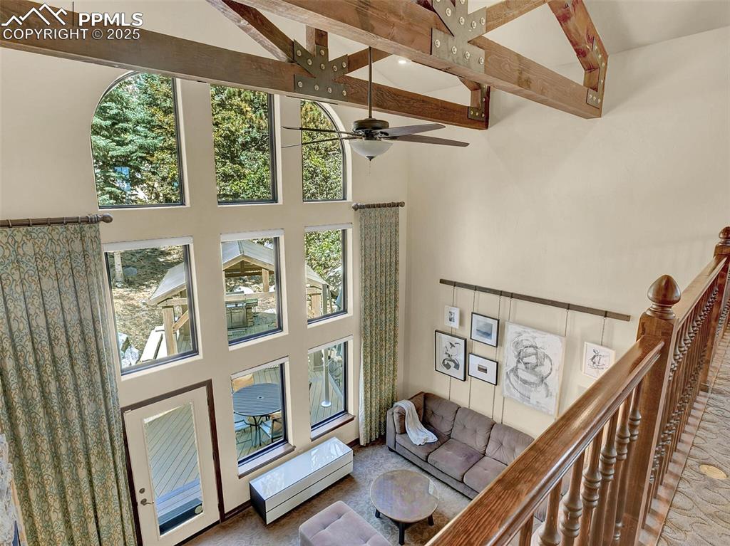 Image 31 of 37: Looking down into living room from upper level