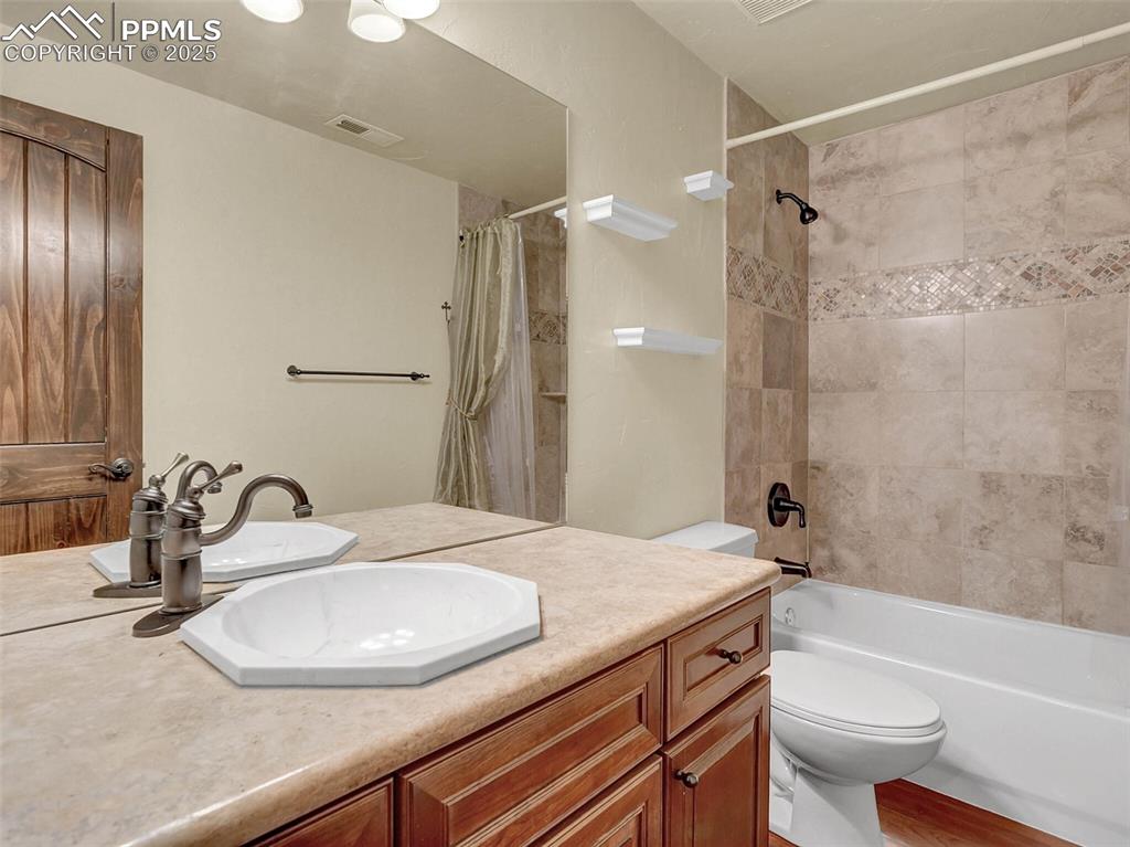 Image 36 of 37: Lower level bathroom