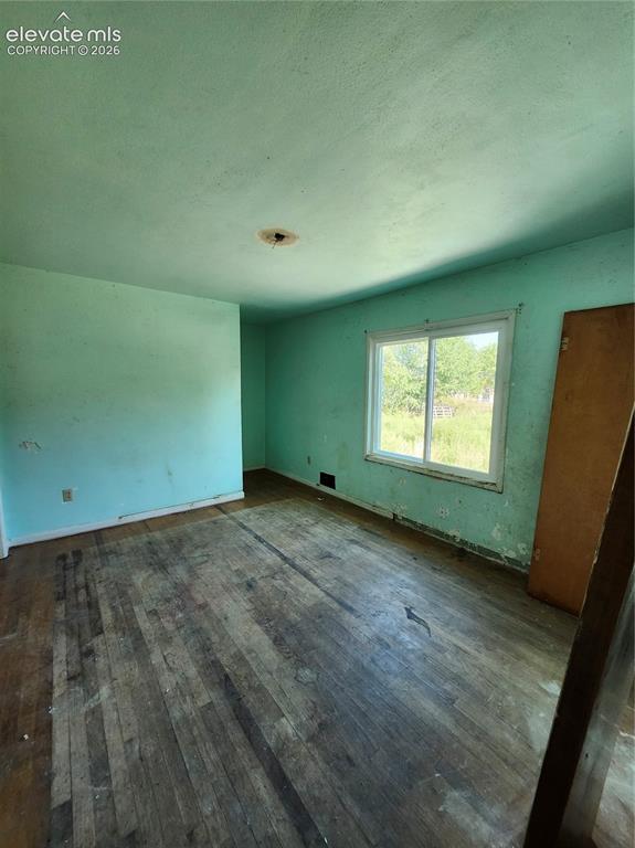 Image 14 of 14: Bedroom, new triple pane window.