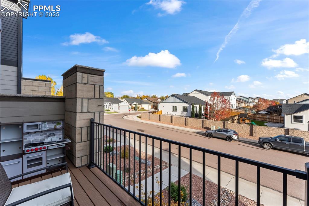 Image 11 of 31: Balcony featuring a residential view
