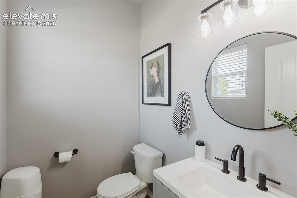 Image 5 of 46: Modern bathroom featuring a contemporary vanity with an integrated sink, ma