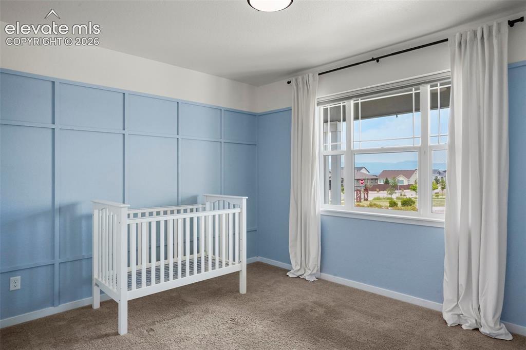 Image 19 of 37: Second bedroom on main