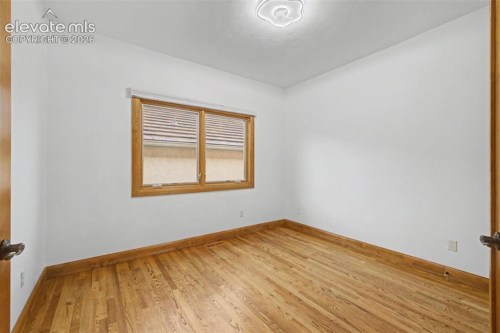 Image 22 of 42: Second main level bedroom