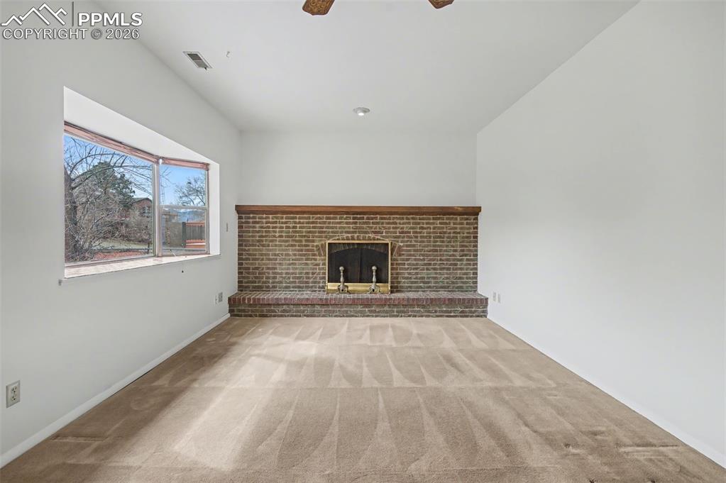 Image 5 of 44: Wood burning fireplace