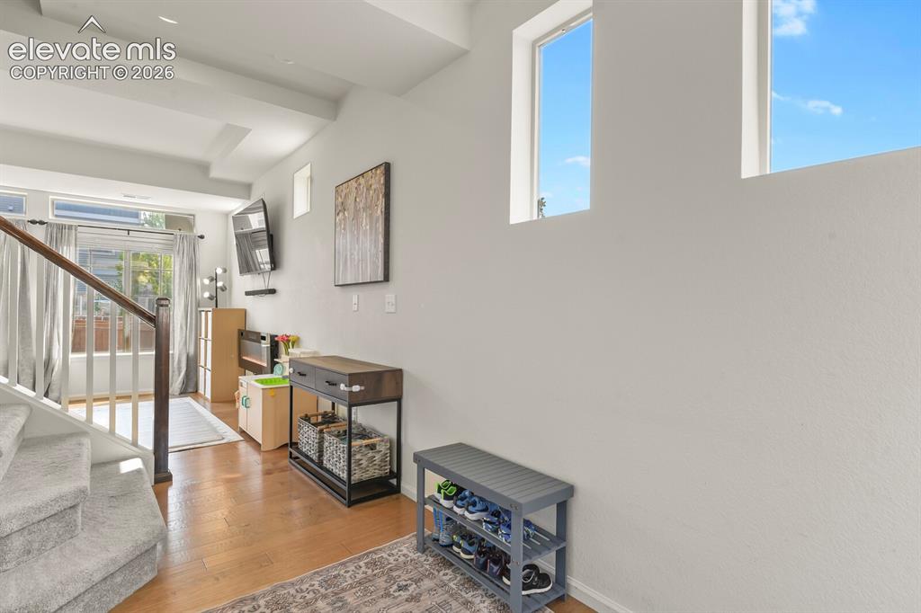 Image 4 of 31: Wood floors and tons of natural light