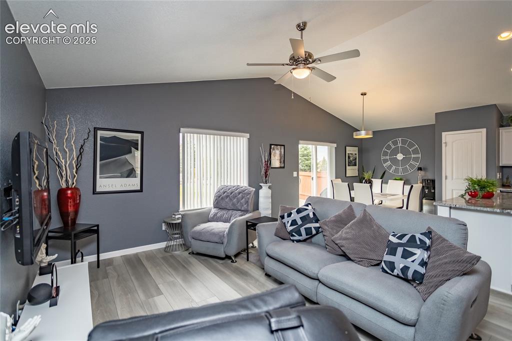 Image 7 of 49: Open and bright floor plan with vaulted ceilings and lots of natural light.