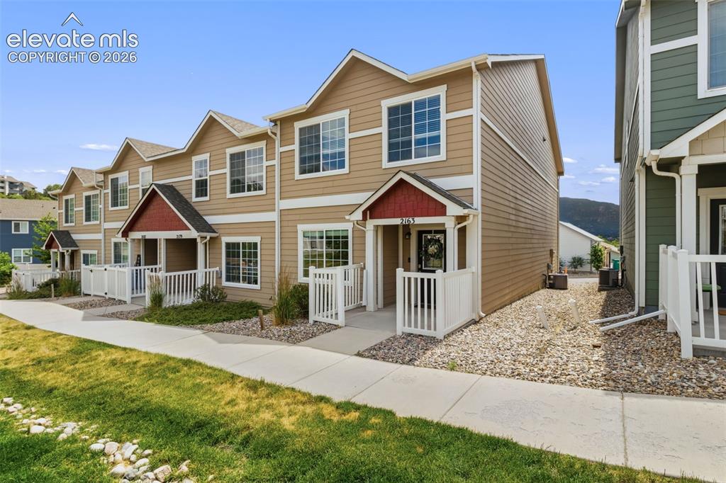 Image 1 of 38: Welcome home to low-maintenance living in the highly desirable Spring Creek