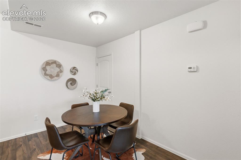 Image 15 of 38: This versatile dining nook can easily be styled to match your lifestyle, fr