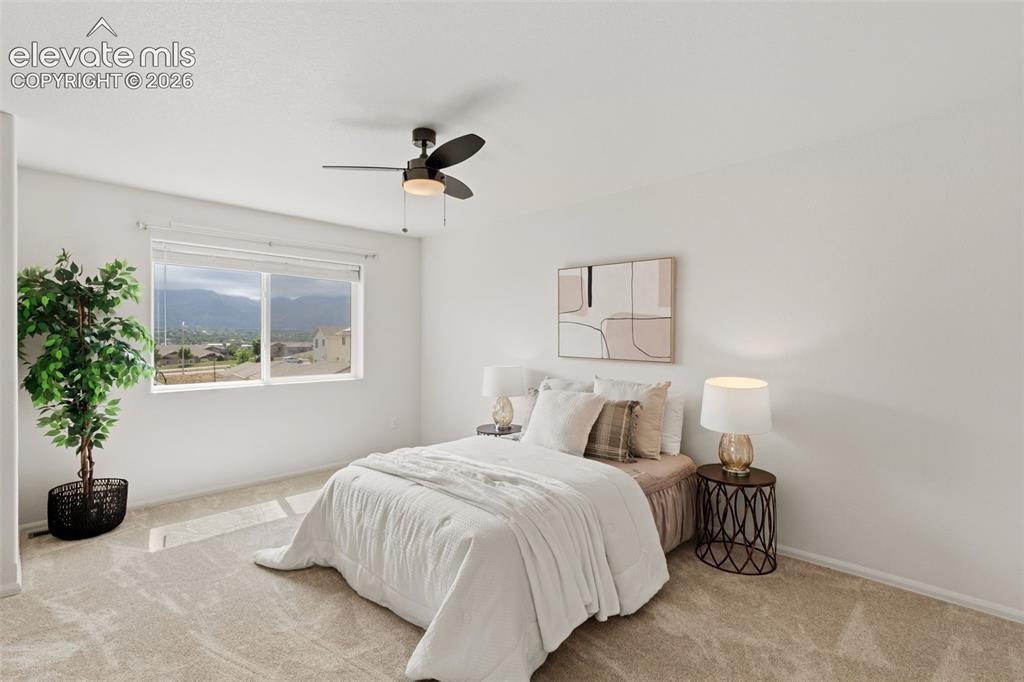 Image 19 of 38: Wake up to stunning mountain views every morning from the comfort of your s