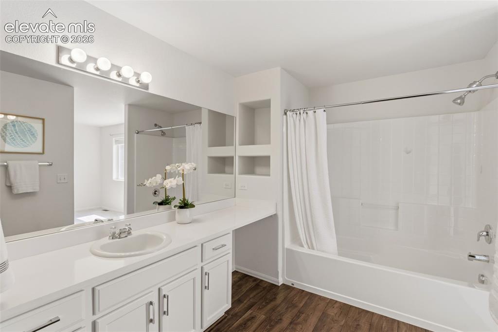 Image 24 of 38: Soak your cares away in the private primary en-suite tub and shower combo