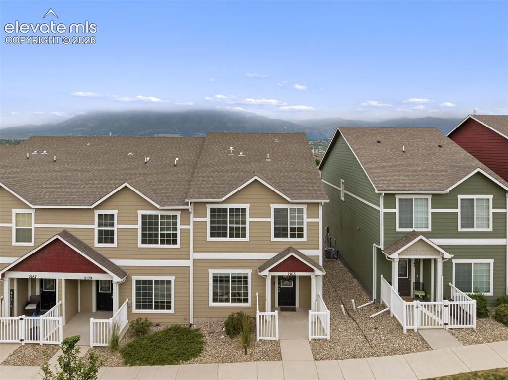 Image 3 of 38: Enjoy breathtaking Front Range and Pikes Peak views right from your beautif