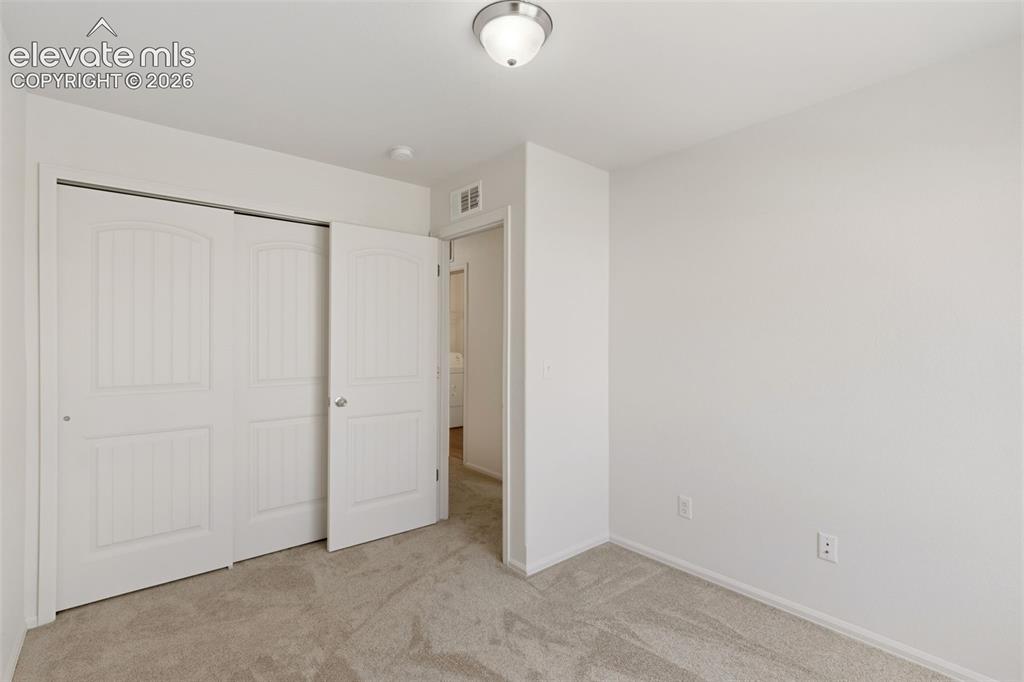 Image 34 of 38: Fresh carpeting and neutral tones provide the perfect foundation for your u