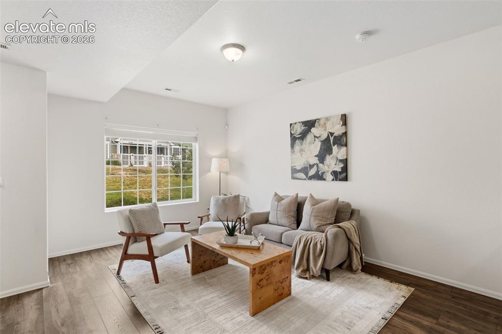 Image 6 of 38: This bright and airy living space is a blank canvas ready for your personal