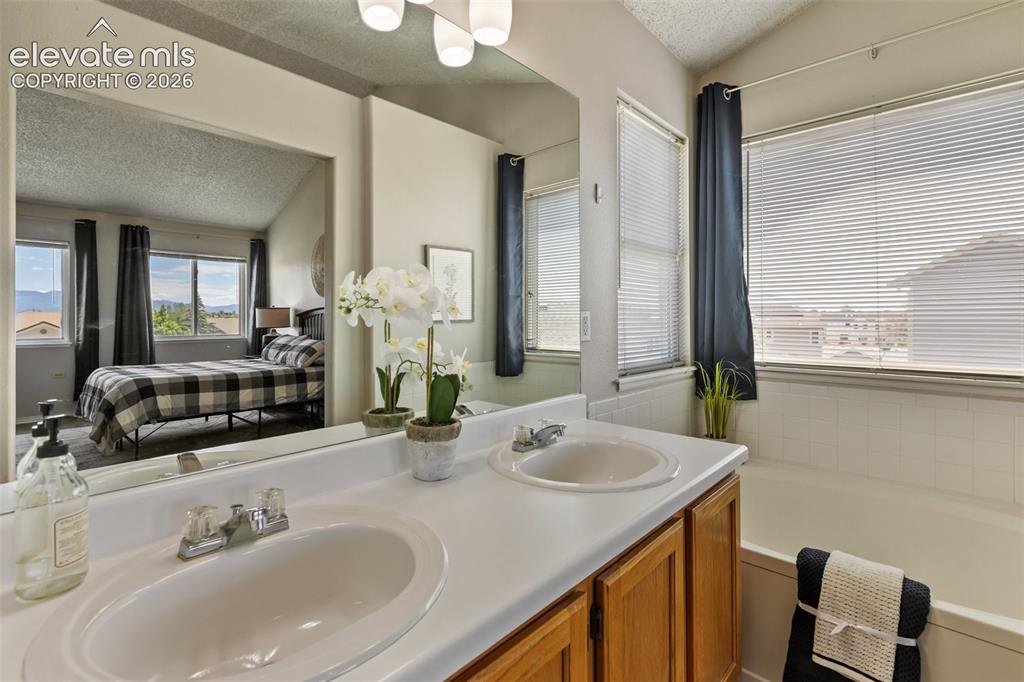 Image 19 of 50: Master Bedroom