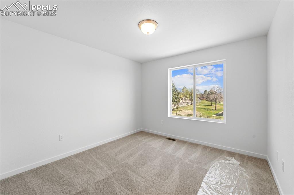 Image 13 of 19: Bedroom