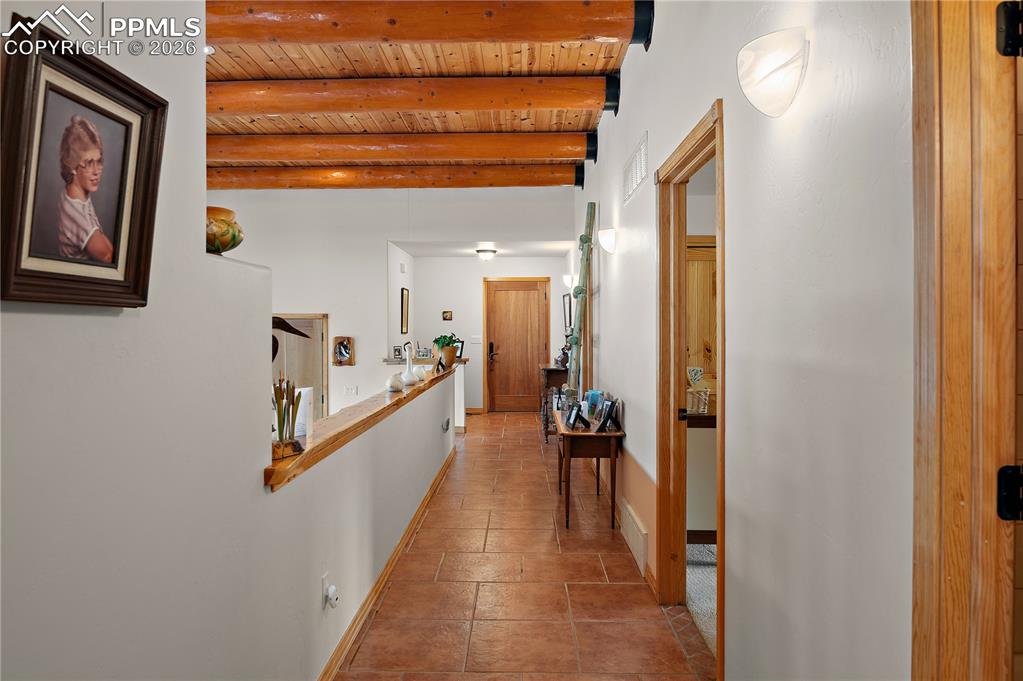 Image 11 of 20: Hallway to bedrooms