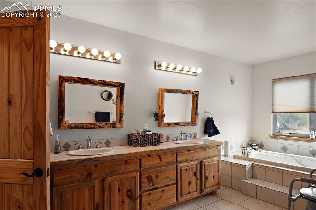 Image 9 of 20: Primary bath with dual sinks