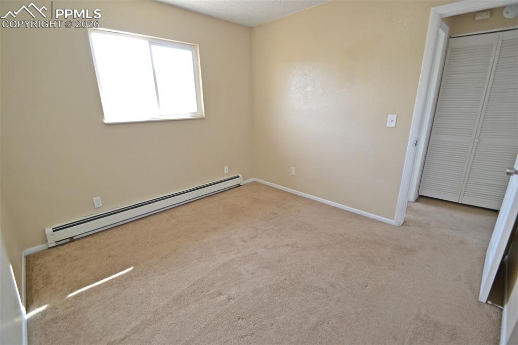 Image 20 of 27: Bedroom