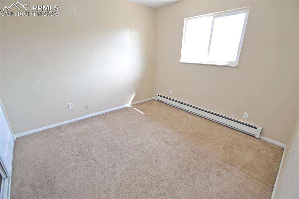 Image 21 of 27: Bedroom