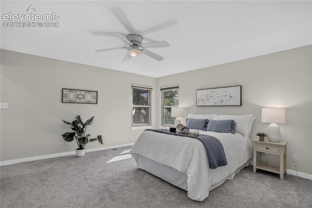 Image 11 of 30: Primary bedroom - upper level