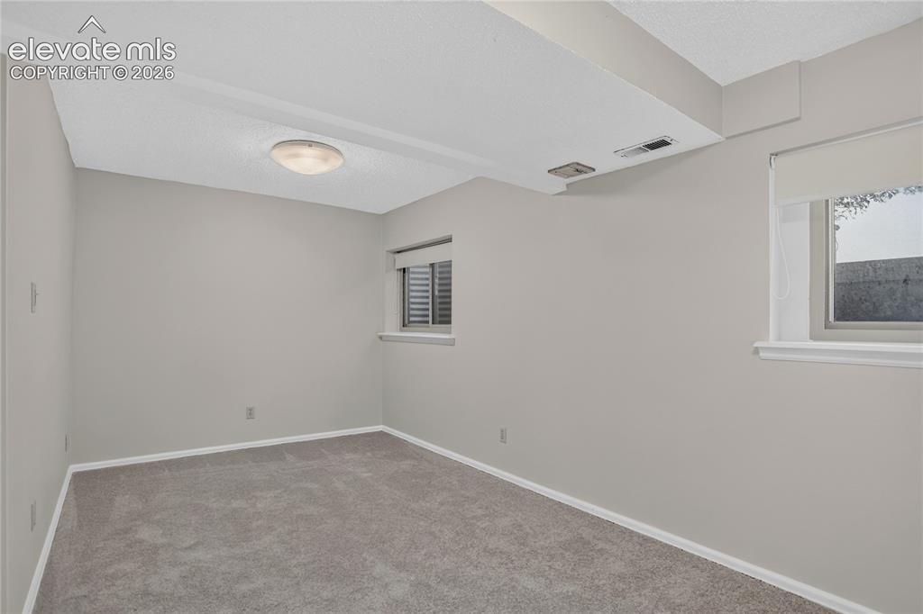 Image 21 of 30: Bedroom 4 - lower level