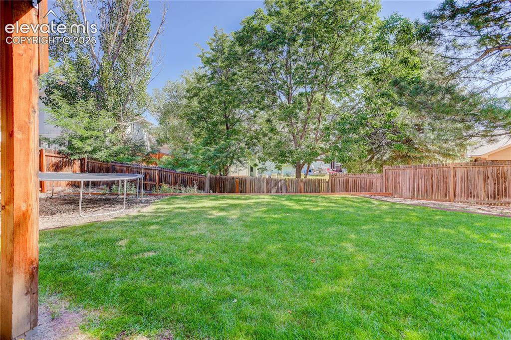 Image 23 of 30: Fully fenced backyard