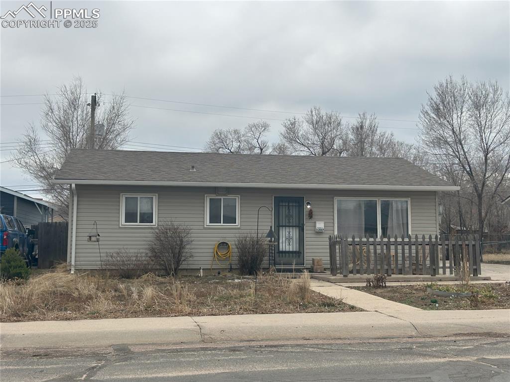 Image 2 of 16: Single story home with roof with shingles