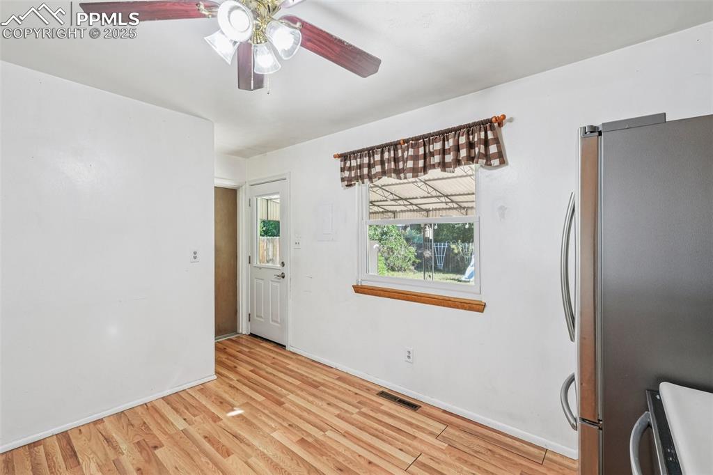 Image 10 of 43: Kitchen Walkout To Backyard