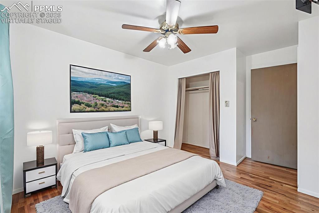 Image 11 of 43: Virtually Staged Main Floor Bedroom #1