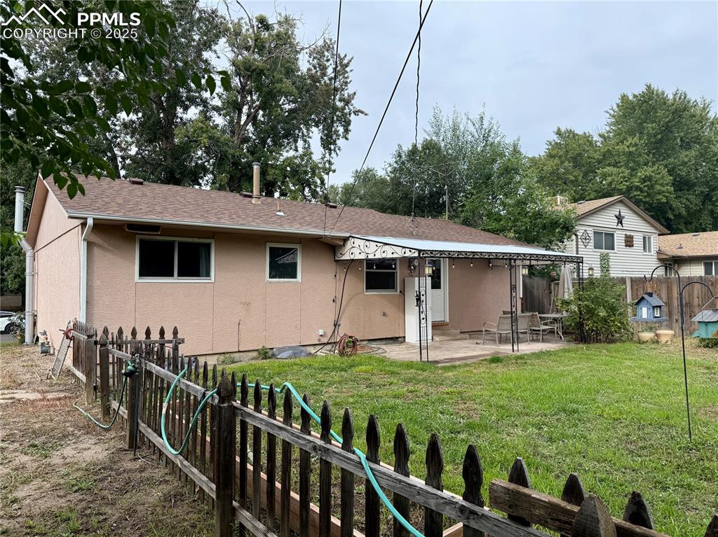 Image 39 of 43: Back Of Home/RV Parking Side