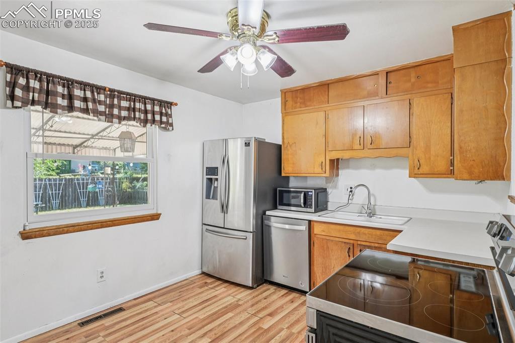 Image 7 of 43: Kitchen With Walkout