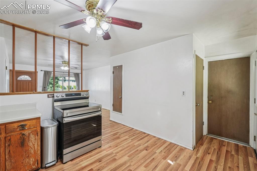 Image 9 of 43: Kitchen Leading To Basement And Garage