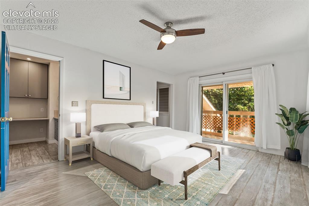 Image 19 of 50: Virtually Staged Primary Bedroom with Adjoining Bath, Walk-In Closet and Ba