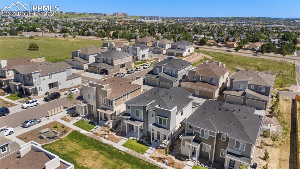 Image 2 of 46: Front aerial perspective of suburban area