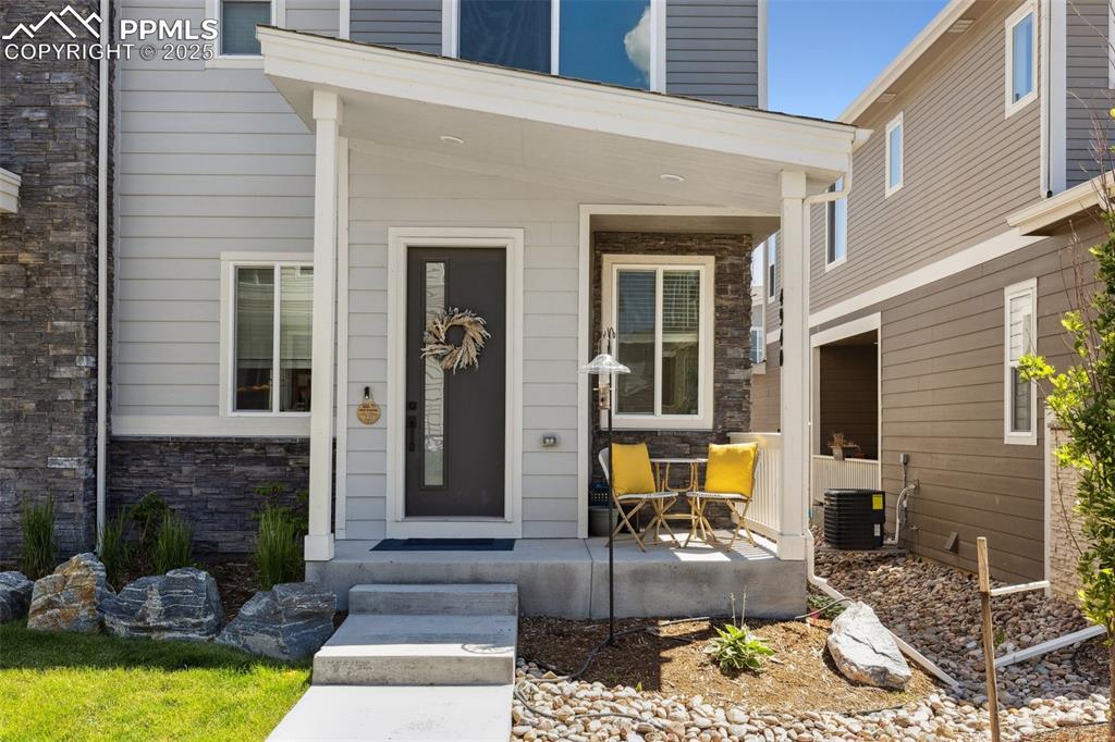 Image 5 of 46: Property entrance with covered porch