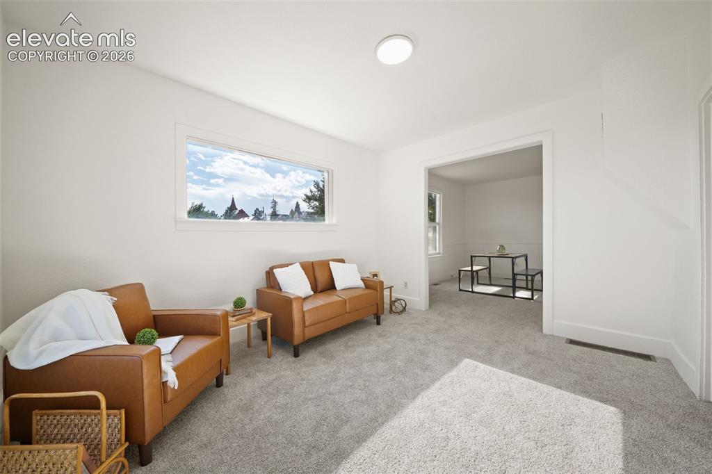 Image 5 of 18: Fresh paint and new carpet throughout