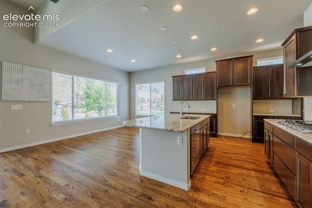 Image 12 of 47: Granite counters with island