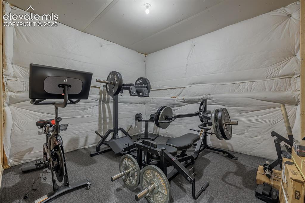 Image 43 of 47: unfinshed room used as exercise