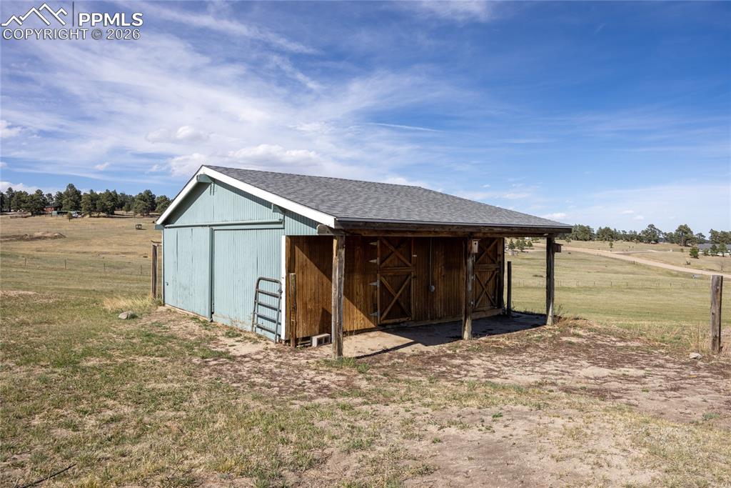 Image 35 of 42: The property features a barn with water and electric