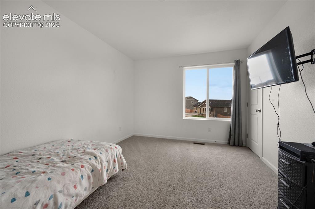 Image 20 of 27: Bedroom
