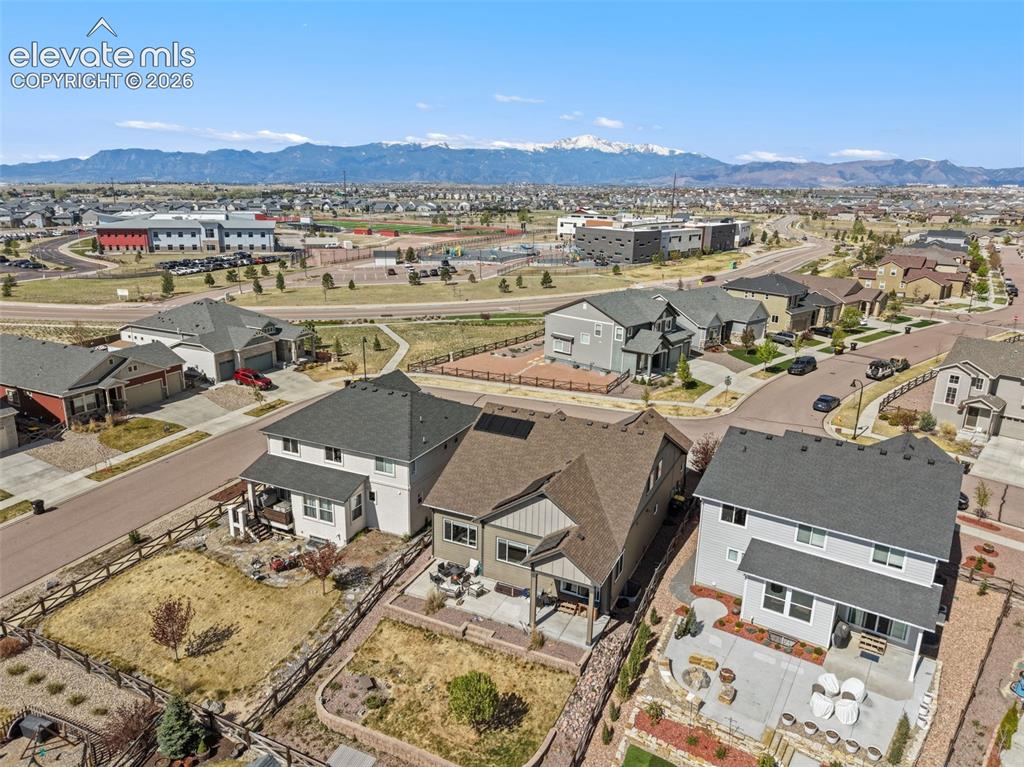 Image 7 of 44: Residential neighborhood with mountain backdrop