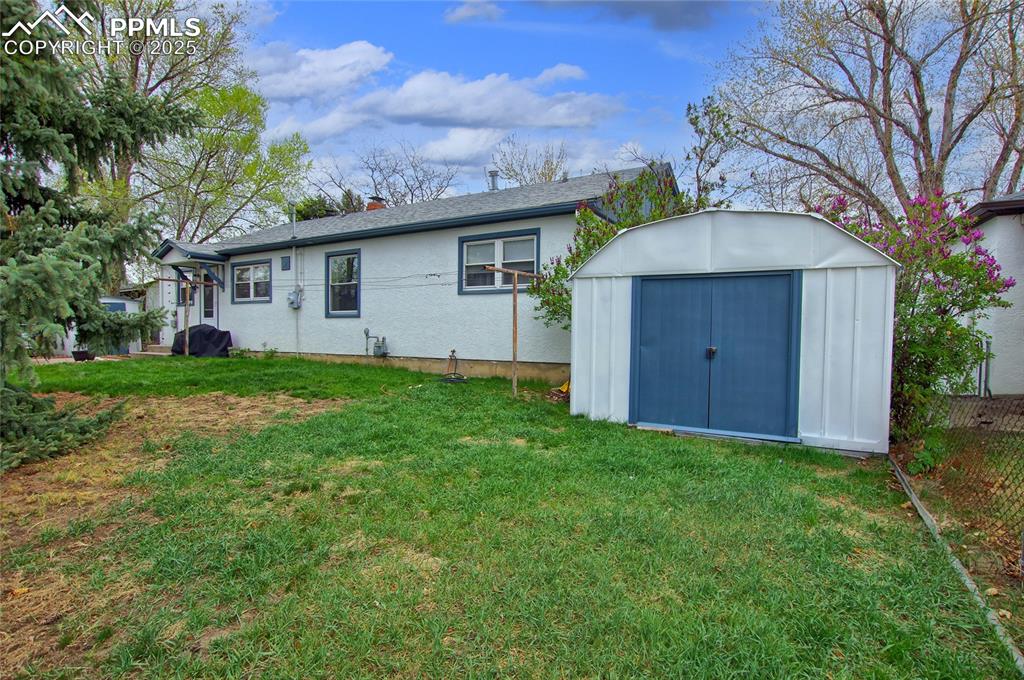 Image 19 of 20: BACK YARD WITH SHED